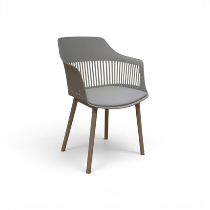 Gharnish Alpha restaurant chair in light grey with a slatted back and wooden legs, featuring an ergonomic seat.