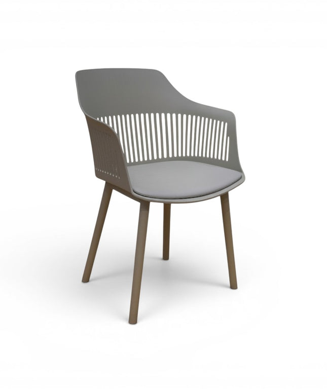 Gharnish Alpha restaurant chair in light grey with a slatted back and wooden legs, featuring an ergonomic seat.