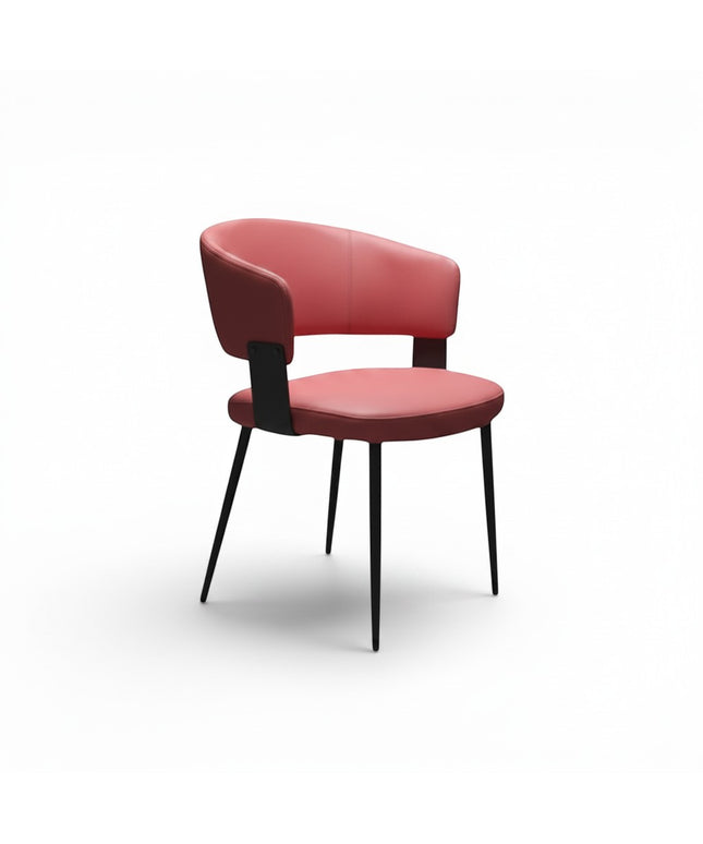 Gharnish modern dining chair  with black metal legs and subtle stitching detail.